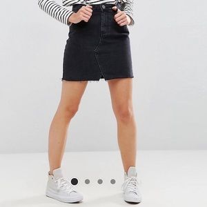 Black denim mini skirt
